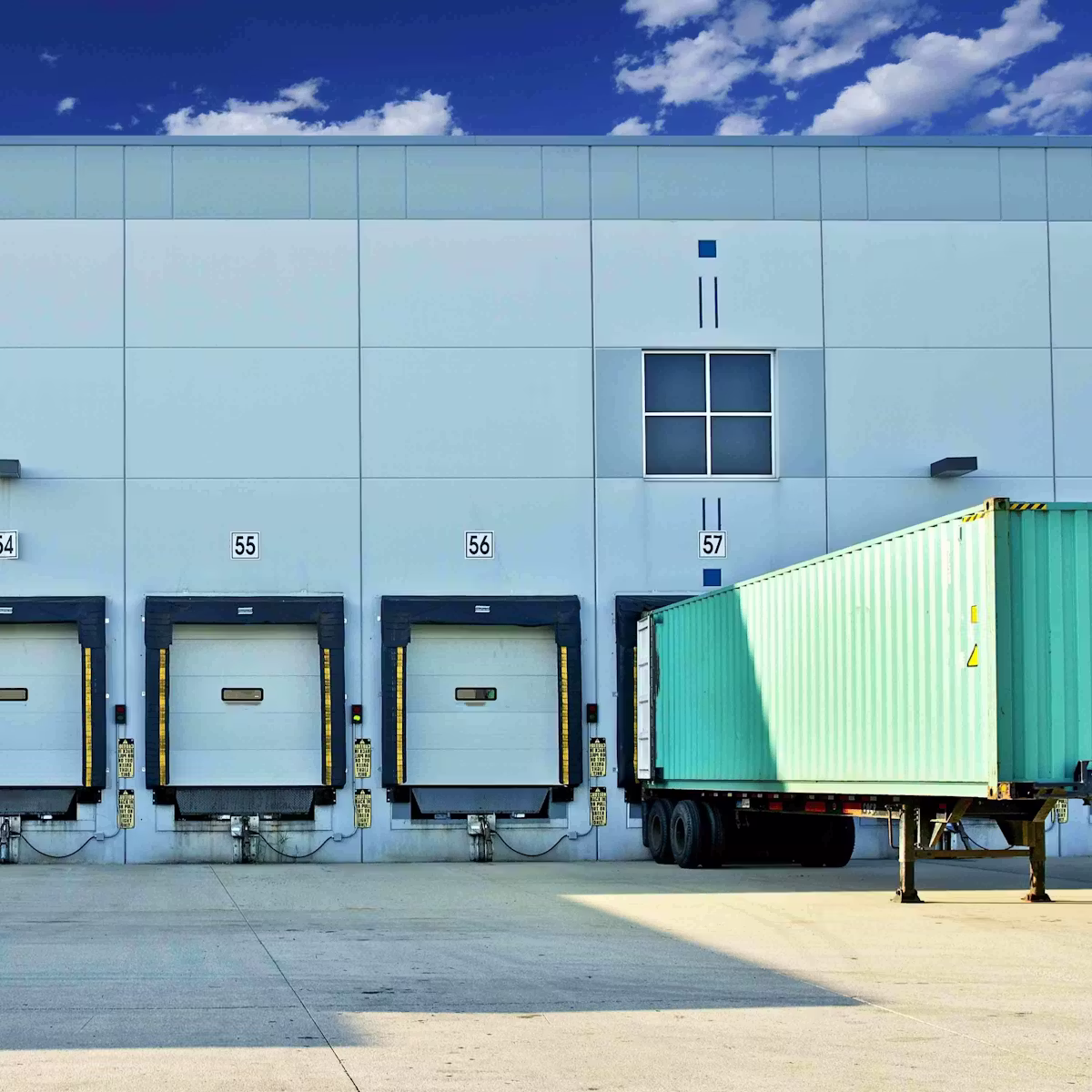 Dock doors warehouse exterior 3000x3000